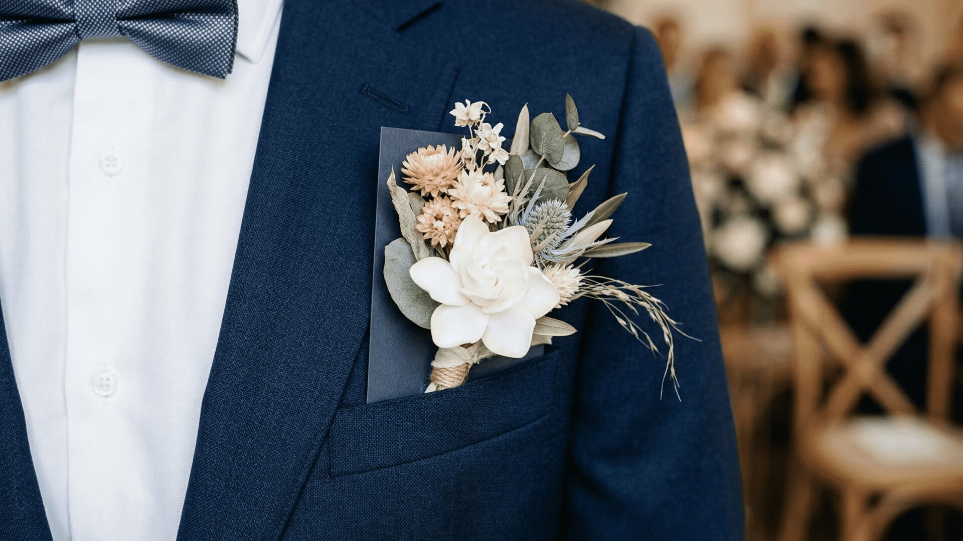 Elegant boutonnière detail on a navy suit lapel