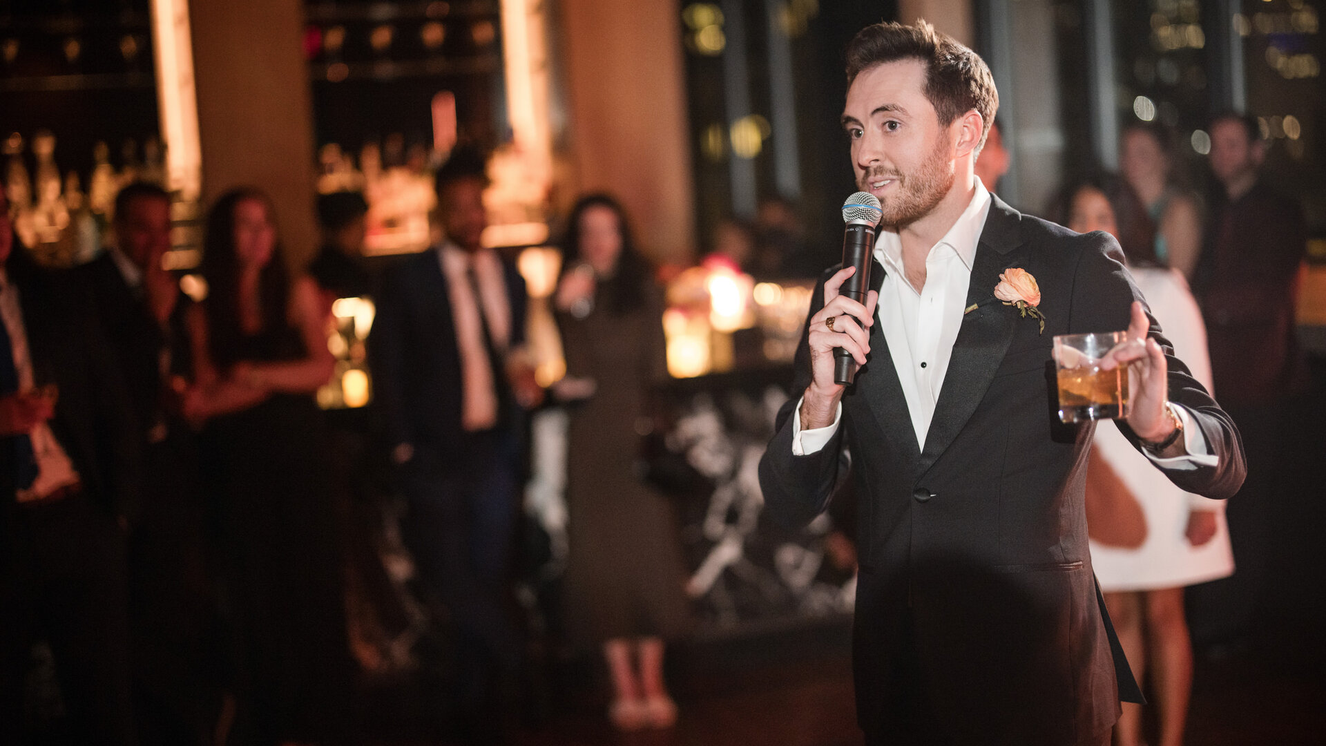 Gentlemen socialising at an elegant formal event